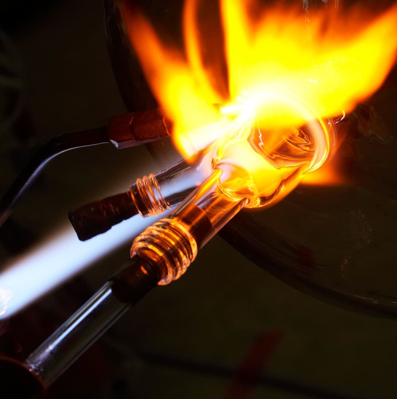 High-quality glass is shaped in a fire.
